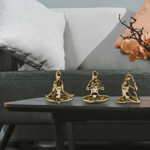Escultura mujer yoga OMM Oro 15.5 x 8 x 18 cm